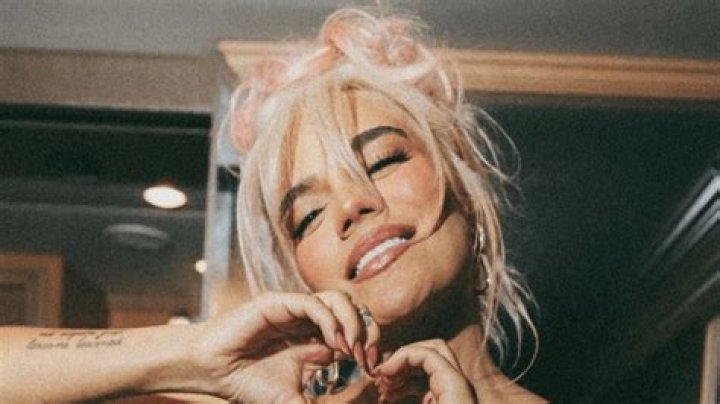 Karol G Shares Swimsuit Photo Having a "Blast"